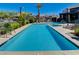 Community pool featuring a clear blue swimming pool and hot tub at 1541 Unison Way # 102, Las Vegas, NV 89135