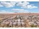 Community aerial view showcases the neighborhood layout with mountains in background at 160 Lilt Ave, Henderson, NV 89011