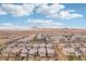Community aerial view showcases the neighborhood layout with mountains in background at 160 Lilt Ave, Henderson, NV 89011