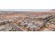 An aerial view showcases the meticulously planned community and the residences with roof-mounted solar panels at 160 Lilt Ave, Henderson, NV 89011