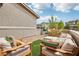 Stylish back patio with outdoor furniture and brick pavers for enjoying a relaxing outdoor living space at 160 Lilt Ave, Henderson, NV 89011