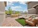Back patio featuring outdoor furniture and brick pavers, perfect for entertaining and enjoying the outdoor living space at 160 Lilt Ave, Henderson, NV 89011