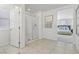 Bathroom features a glass enclosed shower and open doorway with a bedroom view at 160 Lilt Ave, Henderson, NV 89011