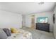 Bright bedroom featuring patterned bedding, a TV on a dresser, and neutral décor at 160 Lilt Ave, Henderson, NV 89011