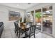 Dining room features a sliding glass door to outdoor dining area with umbrella at 160 Lilt Ave, Henderson, NV 89011
