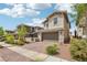 Charming two-story home with manicured landscaping and a welcoming front entrance at 160 Lilt Ave, Henderson, NV 89011