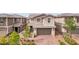 Charming two-story home with manicured landscaping and a welcoming front entrance at 160 Lilt Ave, Henderson, NV 89011
