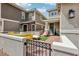 Inviting front patio with stylish outdoor furniture and brick pavers for relaxing and entertaining guests at 160 Lilt Ave, Henderson, NV 89011