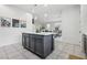 Bright kitchen island featuring pendant lighting and stainless steel appliances at 160 Lilt Ave, Henderson, NV 89011