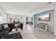 Open concept living room featuring a view into the kitchen and dining area at 160 Lilt Ave, Henderson, NV 89011