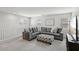 Well-lit loft area with a comfortable sectional sofa and stylish ottoman at 160 Lilt Ave, Henderson, NV 89011