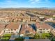 Suburban home in a well-planned community, showcasing the roof, landscaping, and the surrounding neighborhood at 177 Cactus Sunrise St, Las Vegas, NV 89138