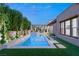 Serene backyard showcasing a sleek pool design, well-maintained landscaping, and a tranquil outdoor living space at 177 Cactus Sunrise St, Las Vegas, NV 89138