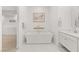 Bathroom featuring a soaking tub and neutral finishes at 177 Cactus Sunrise St, Las Vegas, NV 89138