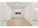 Well-lit bedroom features wood floors and bright windows at 177 Cactus Sunrise St, Las Vegas, NV 89138