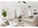 Comfortable guest suite with ample seating, a ceiling fan, and a mirrored closet for added convenience at 177 Cactus Sunrise St, Las Vegas, NV 89138