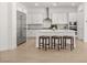 Modern kitchen features a spacious island with seating and stainless steel appliances at 177 Cactus Sunrise St, Las Vegas, NV 89138