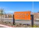 Community entrance sign in Portofino Hills with xeriscape landscaping at 197 Biscotti Ave # Lot 19, North Las Vegas, NV 89084