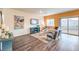 A bright living room has decor with blue, white and black accents at 197 Biscotti Ave # Lot 19, North Las Vegas, NV 89084