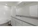 Bathroom features a vanity with stylish countertop and ample space, complemented by a tub at 2606 Lily Point St, Las Vegas, NV 89156