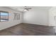 Bright bedroom with vinyl floors and natural lighting, providing a cozy and inviting space for relaxation at 2606 Lily Point St, Las Vegas, NV 89156