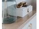Close-up on bathroom decor featuring decorative items on the vanity at 2616 Tolmezzo St, Henderson, NV 89044