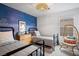 Charming bedroom featuring two twin beds and a stylish accent wall at 2616 Tolmezzo St, Henderson, NV 89044