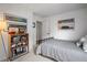 Nicely decorated bedroom with sports memorabilia on display and a single bed at 2616 Tolmezzo St, Henderson, NV 89044