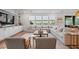 Bright living room featuring a comfortable sectional sofa, built-in shelving, and lots of natural light at 2616 Tolmezzo St, Henderson, NV 89044