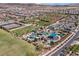 A lovely aerial view of a community park with play areas, sports fields, and picnic facilities at 2616 Tolmezzo St, Henderson, NV 89044