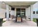 Covered patio featuring an outdoor dining set, perfect for entertaining at 2616 Tolmezzo St, Henderson, NV 89044