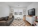 Cozy playroom with a comfortable couch, play table and television at 2616 Tolmezzo St, Henderson, NV 89044
