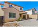 Exterior shot of backyard featuring stone landscaping, a basketball hoop, and covered patio at 2664 Strichen Ave, Henderson, NV 89044