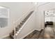 Bright entryway with hardwood floors and a staircase leading to the second floor at 2664 Strichen Ave, Henderson, NV 89044