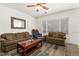 Inviting living room with comfortable seating and wood-look floors at 2664 Strichen Ave, Henderson, NV 89044