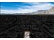 Aerial view of a single-Gathering home in a neighborhood with mountain views at 2913 Laverton Dr, Las Vegas, NV 89134