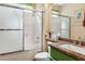 Bathroom with vanity, granite countertop, toilet, and glass-enclosed shower/tub combo at 2913 Laverton Dr, Las Vegas, NV 89134