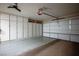 Spacious garage featuring built-in cabinets, and an automatic door opener at 2913 Laverton Dr, Las Vegas, NV 89134