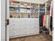 Walk-in closet with built-in shelving, drawers, and ample storage for clothing and accessories at 2913 Laverton Dr, Las Vegas, NV 89134