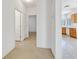 Hallway leading to multiple rooms with neutral carpet and bright paint at 3036 Monroe Park Rd, Henderson, NV 89052