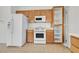 Kitchen area showcasing matching white appliances and ample cabinet space at 3036 Monroe Park Rd, Henderson, NV 89052