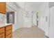 Open kitchen area featuring a view of the living spaces and front door at 3036 Monroe Park Rd, Henderson, NV 89052