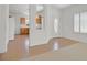 Open-concept layout with tiled flooring and view to the kitchen area at 3036 Monroe Park Rd, Henderson, NV 89052