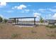 Outdoor community amenity featuring a shaded structure with picnic tables and landscaping at 333 Aravalli Crest St, Henderson, NV 89015