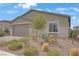 Charming single-story home featuring a low maintenance desert landscaped front yard at 333 Aravalli Crest St, Henderson, NV 89015