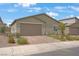 Charming single-story home featuring a low maintenance desert landscaped front yard at 333 Aravalli Crest St, Henderson, NV 89015