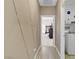 Hallway view showcasing stylish wall decor and access to laundry room and bedroom at 333 Aravalli Crest St, Henderson, NV 89015