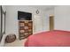 Interior view of main bedroom, with TV and entrance into en suite bathroom at 333 Aravalli Crest St, Henderson, NV 89015