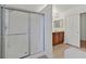 Bright bathroom with glass-enclosed shower and double vanity at 3457 Abilene Gold Ct, Las Vegas, NV 89129