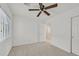 Bright bedroom with ceiling fan, window with blinds, neutral carpet, and closet at 3457 Abilene Gold Ct, Las Vegas, NV 89129